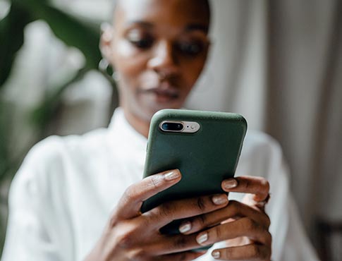 Woman using smart phone.